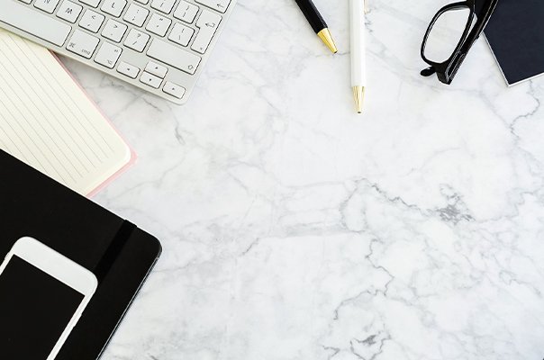 Productivity workspace with digital tools and Chrome extensions on screen