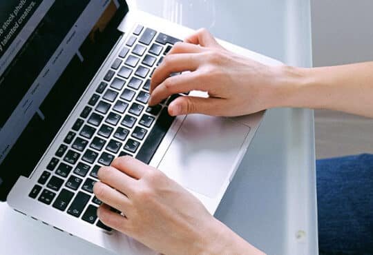 A high-tech digital workspace showing various AI app icons for freelancers.