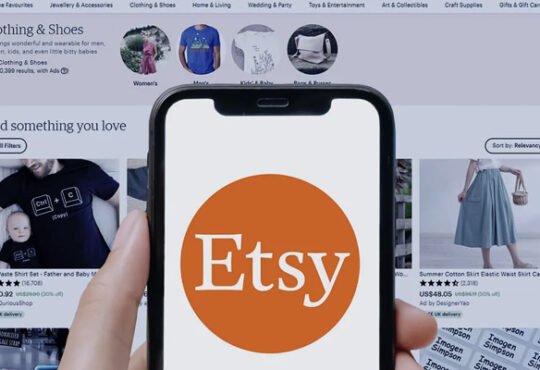 Laptop screen showing Etsy shop with digital planners and art prints