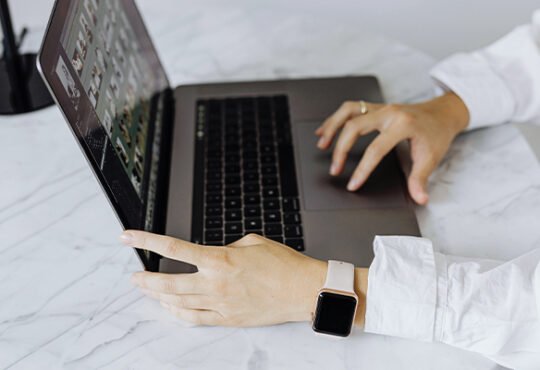 Freelancer working on laptop from home