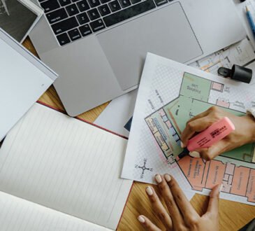 Man working from laptop at home, exploring side hustles for online income 2025.