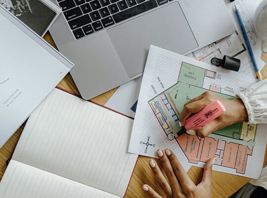 Man working from laptop at home, exploring side hustles for online income 2025.